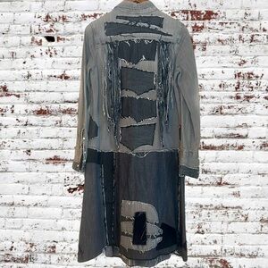 Upcycled tattered and ragged patched up denim duster
